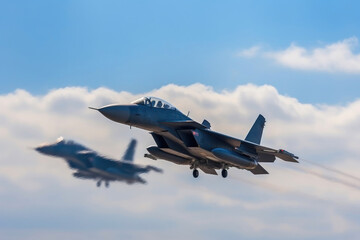 Fototapeta na wymiar Dynamic Flight: Fighter Jets at their Best