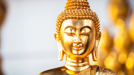 Buddha statue, golden Buddha head, focus on the golden Buddha head.