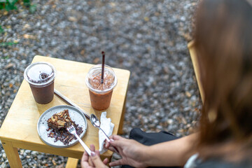 Background of wooden chairs or modern chairs that are placed in the interior of a restaurant or coffee shop for customers to sit while using the service.