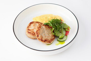 Chicken cutlet.Chicken cutlet with mashed potatoes on white background. Healthy food. Space for copying. Isolated object.