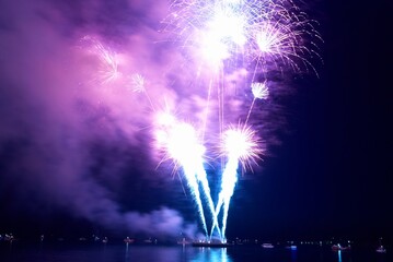 Holiday fireworks on the black sky background