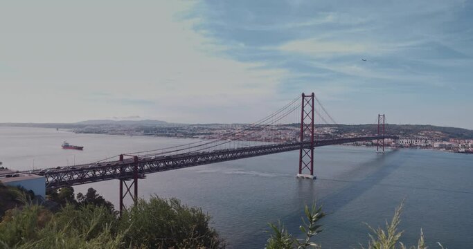 25 de Abril Bridge, with the city of Lisbon in the background.