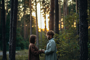 couple in love in the forest. The concept of love, devotion and fidelity in a couple