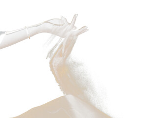 Hand releasing dropping sand on hill. Fine Sand flowing pouring through fingers hand against black background. Summer sand hill beach holiday vacation and time passing concept. Isolated freeze shot