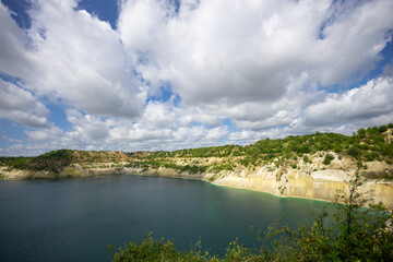 Naklejka premium Landscape with water in a chalk quarry