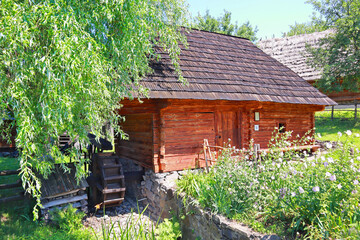 Wooden water mill in Zakarpattia Skansen Museum of Folk Architecture and Customs in Uzhhorod, Ukraine