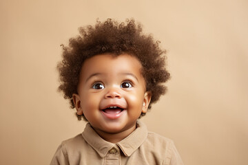 candid studio portrait of a cute black baby, funny face