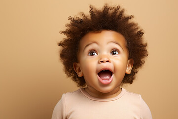 candid studio portrait of a cute black baby, funny face