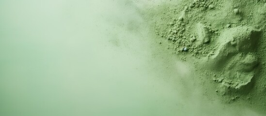 Green powder seen on a isolated pastel background Copy space
