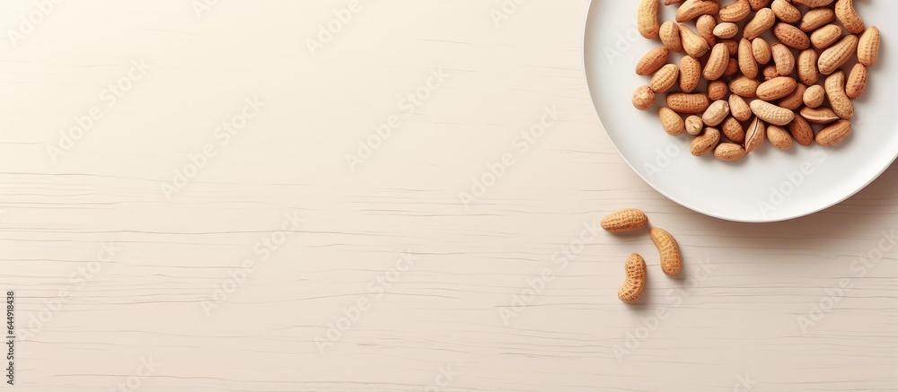 Poster groundnut isolated on a isolated pastel background copy space in a white plate