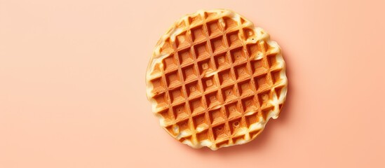 Belgian waffles freshly baked and on a isolated pastel background Copy space