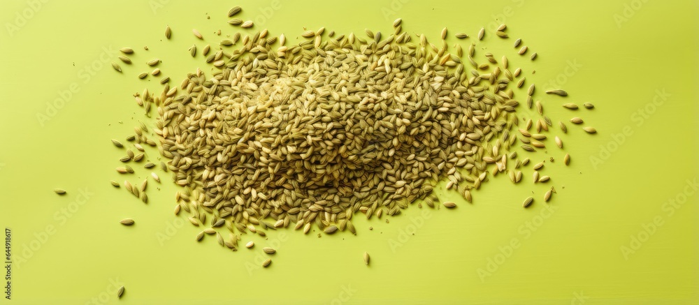 Aufkleber top view of isolated celery seed pile on a isolated pastel background copy space