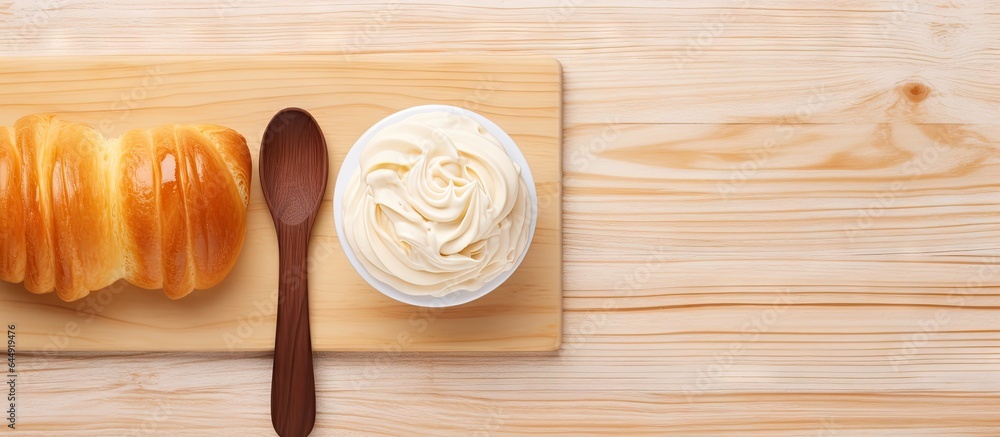 Poster Top view of choux cream on isolated pastel background Copy space en board isolated with fork