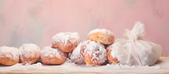 Obraz na płótnie Canvas New donuts made with cottage cheese powdered sugar paper bag space for copying isolated pastel background Copy space