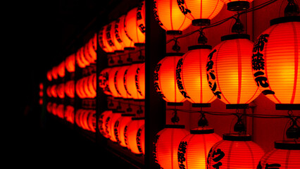 japanese lanterns in red outside shining wall