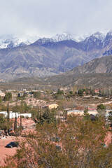 Fototapeta na wymiar the andes mountain range in mendoza argentina with imposing mountains and snow-capped peaks.