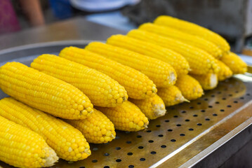 Boiled cooked corn in Jalan Alor street food in Kuala Lumpur