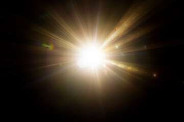 Golden sunlight,Abstract sun burst ,digital lens flare on black background for overlay