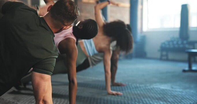 Fitness, class and people in gym, muscle training and body stretching with workout for health and wellness. Bodybuilding, active and exercise at club sports group and strong together with energy