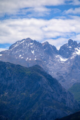 Fototapeta premium View on Naranjo de Bulnes or Picu Urriellu, limestone peak dating from Paleozoic Era, located in Macizo Central region of Picos de Europa, mountain range in Asturias, Spain