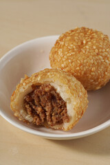 Popular glutinous sesame balls dessert in South East Asia, Onde-onde filled with ground peanuts paste. 