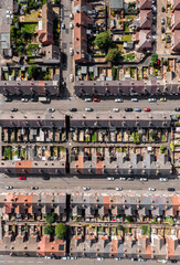 Aerial view directly above the rooftops of a block of back to back terraced houses in the North of England