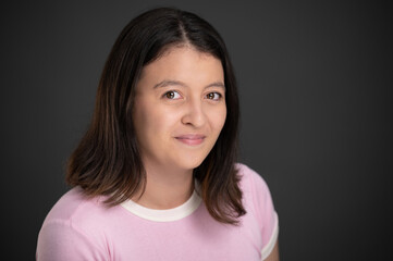 Portrait headshot of young hispanic woman