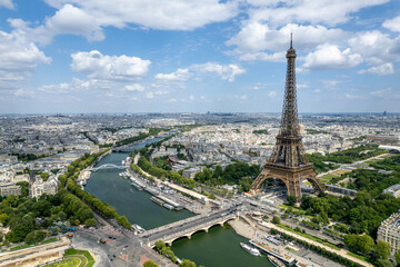 Aerial view of the Eiffel Tower, a wrought-iron lattice tower, on the Champ de Mars, the main landmark in Paris, France. - obrazy, fototapety, plakaty