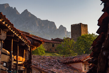 Mogrovejo village in the Picos de Europa Spain - Sunrise above the stunning farmland village of...