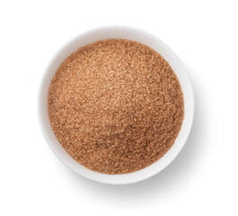 Top view of brown granulated sugar in ceramic bowl