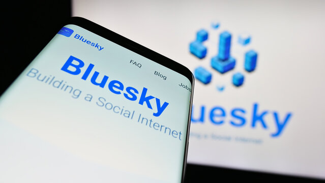 Stuttgart, Germany - 09-02-2023: Mobile phone with website of social network initiative Bluesky on screen in front of logo. Focus on top-left of phone display.