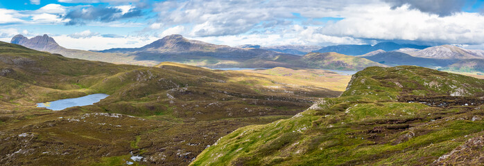 Great panorama of Highland mountain range in Scotland, UK.