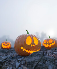 Selection of carved Halloween pumpkins on a remote rocky ground covered in mist 3d render