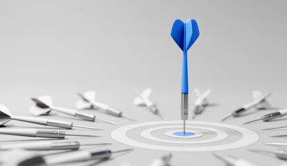 Dart arrow on center of dartboard, metaphor to target success, winner concept,competitive advantage, strategic marketing concept