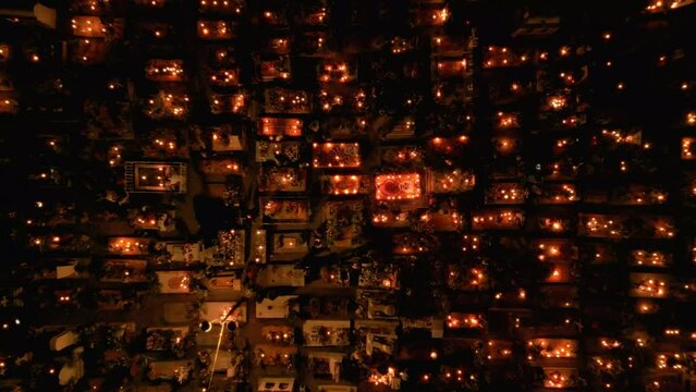 Birds eye view of a well lit cemetery during day of the dead in Mexico