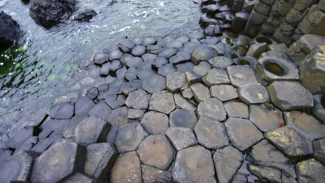 Point of view walking down Giants Causeway Ireland