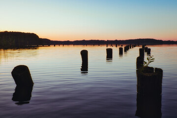 Sunset on the Lake -  Landscape - Beautiful - silhouette  - Sunrise Sea - Colorful - Reed - Clouds - Sky - Sundown - Sun - Wood - Stake - Water - Background - Summer