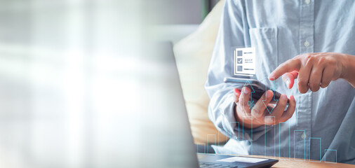 Cost reduction Concept. Businessman with his hand lowers the arrow of the graph. Cost text with a...