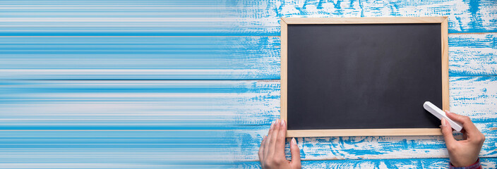 woman hand chalk and board