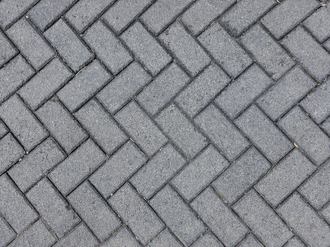 Outdoor grey paving texture, good for residential townhouse road complex or pavement or sidewalk base material.