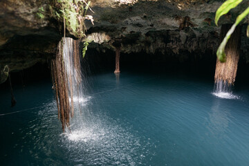 waterfall inside cenote cave