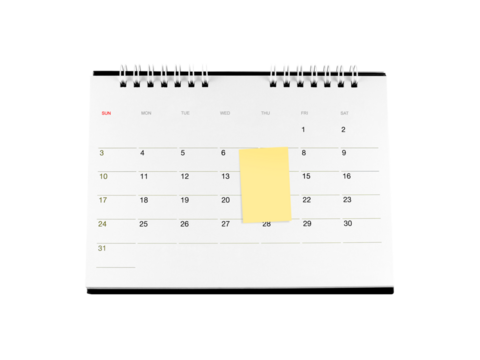 sticky note attached on cardboard desk calendar with date isolated on transparent