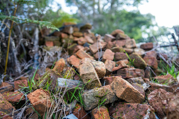 very old pile of red convict bricks for construction in tasmania australia