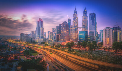 Cityscape of Kuala lumpur city skyline at sunrise in Malaysia.