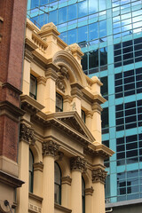 Obraz premium A Sydney streetscape of new and old buildings in the city