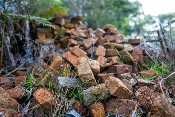 very old pile of red convict bricks for construction in tasmania australia