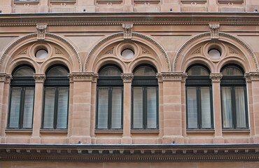 Arched windows of the heritage-listed sandstone General Post Office, Sydney. Victorian Italian Renaissance Style.  Now owned by Far East Organisation. © Rose Makin