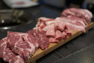 Rare beef and pork, prepared for Korean Style Barbecue