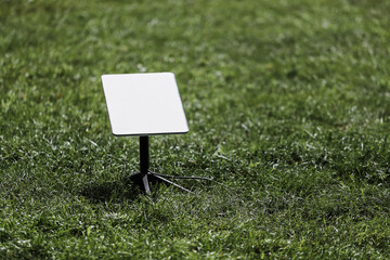 Starlink satellite-based (Satellite internet constellation) on the lawn of the park during the day