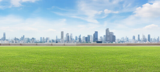 Fototapeta na wymiar Empty lawn floors city skyline and modern business office buildings with blue cloud sky